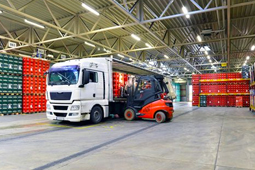 forklift and truck in warehouse